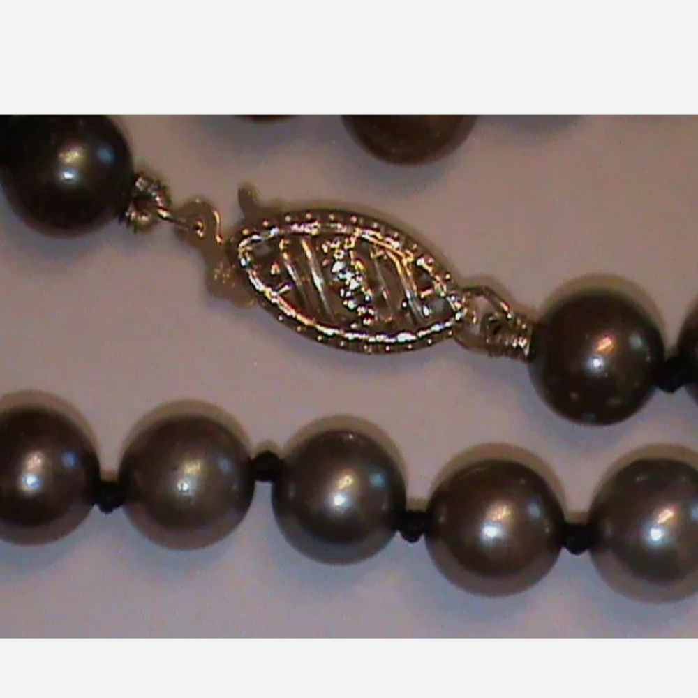 14k black pearls